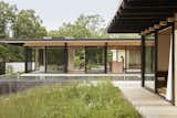 Sliding walls of glass by Arcadia are situated throughout.