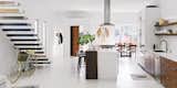 A Cinder Block Duplex in Charleston Is Recast as a New York–Style Loft