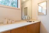 The master bathroom offers updated fixtures, as well as a large shower.