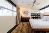 Although the Lew House is over 60 years old, it’s been remarkably well preserved. Midcentury modern details like warm colors and platform beds can be found throughout the home.