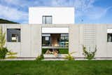 A Family Home in Slovakia Holds a Playground for Kids and Pets