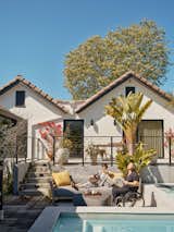 The home's windows are from Fleetwood Windows &amp; Doors, while the sofa is from Teak Warehouse.