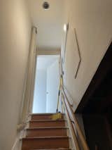 The basement stair was narrow and cramped.