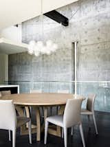 The interior concrete walls echo the ones on the exterior.