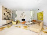 The home comes complete with all the original Elrod furnishings and art—including this massive carpet by V’Soske. 
