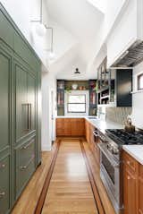 The renovation made only minor changes to the kitchen's original footprint changes were minimal. However, the entire ceiling was vaulted and skylights were added for additional natural light. "This was a reaction to the neighbors building an ADU right up to their property line,