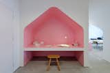 The pink desk nook references the cherry blossoms that bloom in Japan every spring.