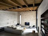 Contemporary materials like concrete and steel are a wonderful contrast to the ancient stone walls.