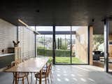 Breezy Courtyards Brighten Up a Dated Tasmanian Home