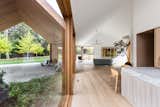 An Undulating Roof Flows Across the Barn-Like Modules of a Striking Long Island Home - Photo 7 of 13 - 
