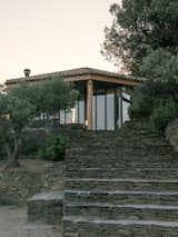 Casa Rumeu was designed by Correa Milá Arquitectes in 1963 for the Rumeu family. While it is within walking distance of the center of Cadaqués, it feels separate, surrounded by olive groves. Part of the remodel entailed creating more garden spaces, "especially within the olive tree plantations, which are an important component of the estate’s overall charm,