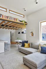 Cradle-to-cradle certified carpet from the Shaw Group adds a warm layer in the living room.

