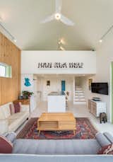 Ample storage is built into every corner of the home, from the stair treads to the kitchen bench. Since the client moved into the home, a ceiling fan and portable heater have been sufficient on both the warmest and coldest days. The smart energy monitoring system, Smappee, shows a consistent ambient temperature within the house of 20°C.