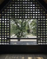 The street front, on the south side of the property, is directly across from a busy intersection. “This problem resulted in the gable trellis balcony, one of our favorite design features,” reveals architect Nicholas Fiore. “The balcony serves three functions: as a headlight filter, as a subtle nighttime beacon when lit from within, and as a nod to a favorite Mapleton Hill historic detail—gable woodwork filigree, which is seen throughout the neighborhood.” 