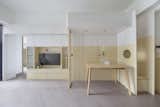 A Tiny Apartment in Hong Kong Uses Adaptable Joinery to Expand the Space